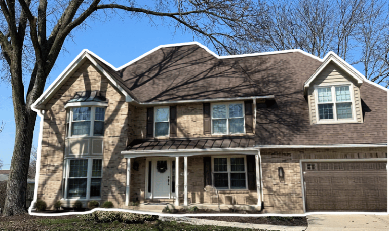 Glen Ellyn home after metal roof installation was requested to complement the new bay window
