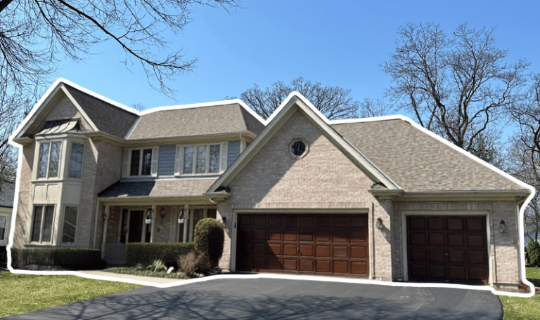 New roof replacement plus freshly stained garage doors to match this charming Naperville home