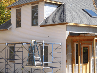 Scaffolding set up to help contractors replace this home's exterior