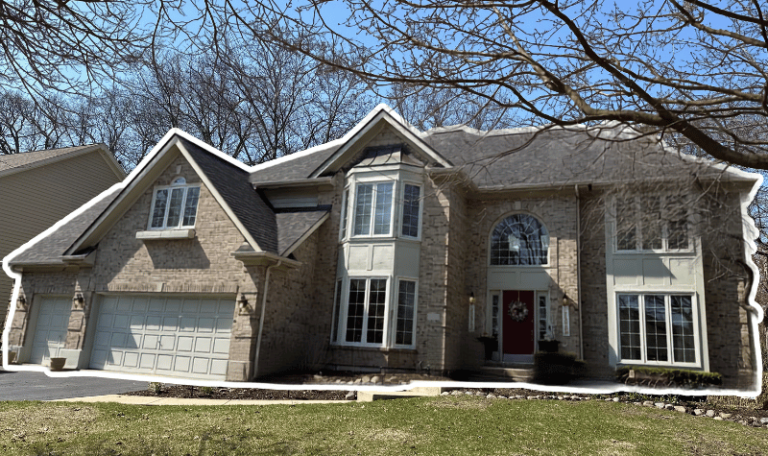 A Saint Charles roof replaced after worn shingles left asphalt pieces in gutters