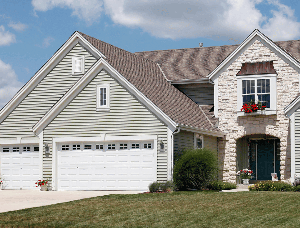 Top to Bottom Exteriors provides roofing and siding services to homes in Hoffman Estates, Illinois.