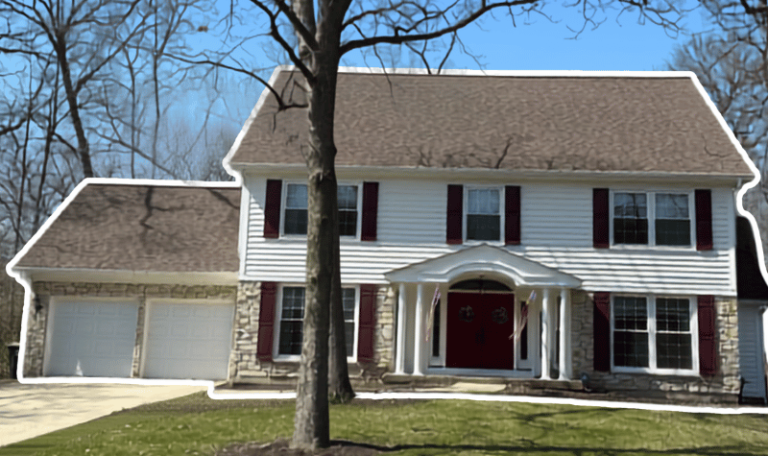 New roof, gutters, paint, and shutters were installed on this West Chicago home restored after tree damage