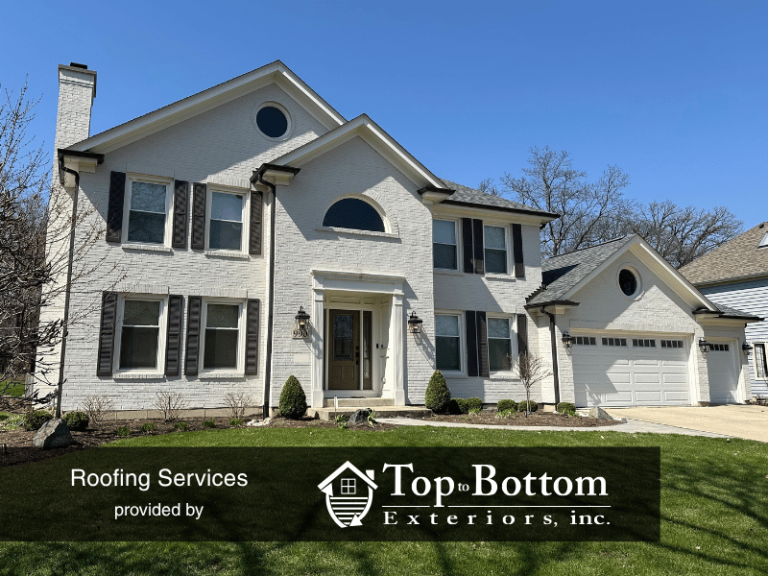 Wheaton home with new roof and gutters installed to stop leak and water damage