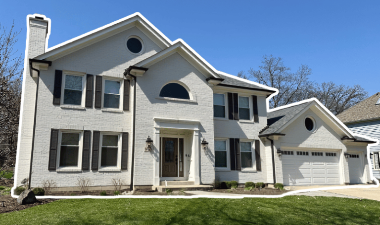 Wheaton home with new roof and modern gutters to stop water damage
