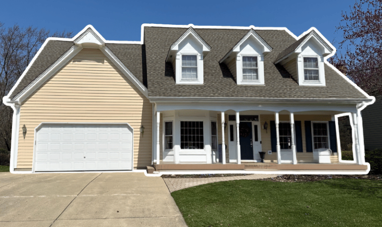 Wheaton home with new roof, gutters, and siding replacement, plus cedar siding paint