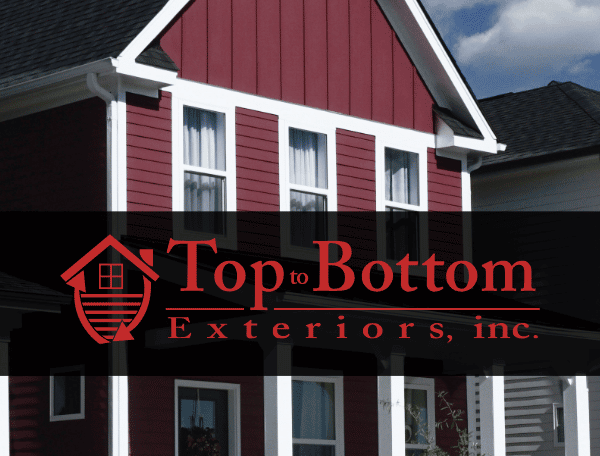 Red suburban home with Top to Bottom Exteriors logo over it