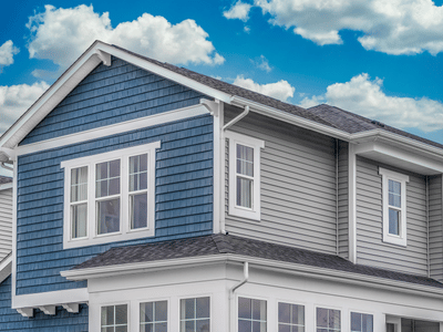 Exterior view of home as siding is being replaced