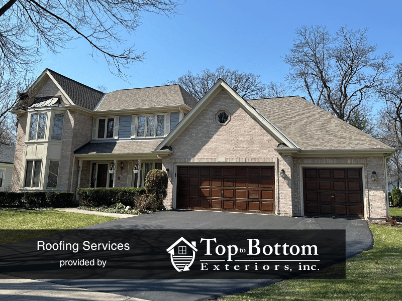 Naperville home with new roof and freshly stained garage doors in coordinated color