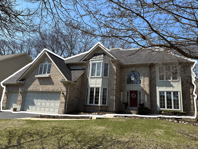 A Saint Charles roof replaced after worn shingles left asphalt pieces in gutters