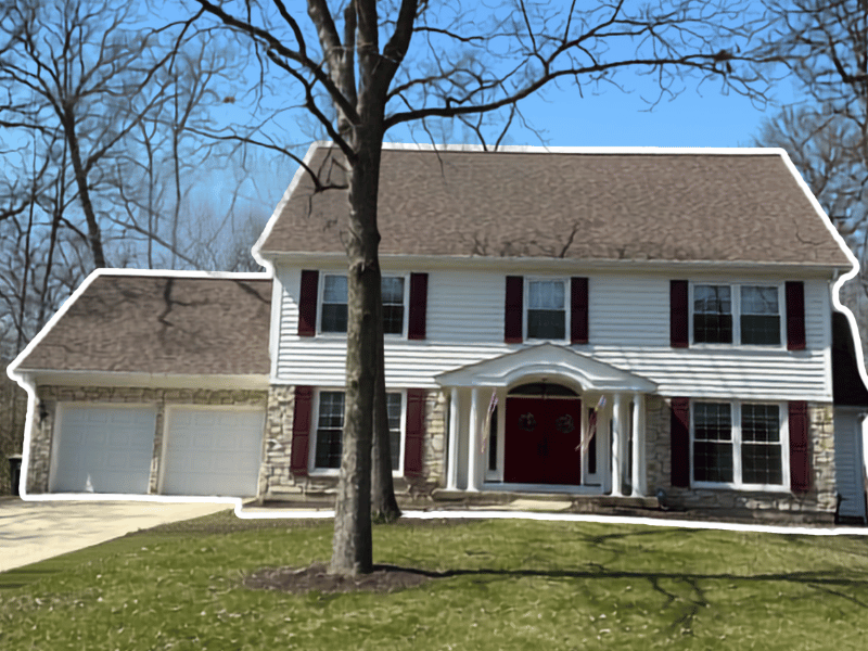 New roof, gutters, paint, and shutters were installed on this West Chicago home restored after tree damage