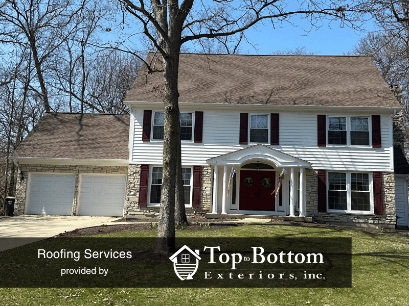 West Chicago home restored after tree damage with new roof, gutters, paint, and shutters
